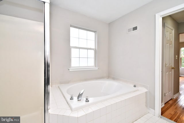 316 Wheatfield Cir, Hatfield, PA 19440 - bathroom featuring a garden tub and baseboards