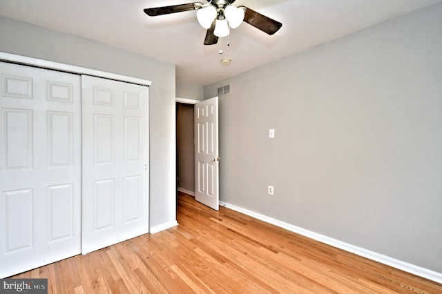 316 Wheatfield Cir, Hatfield, PA 19440 - unfurnished bedroom featuring light wood finished floors, a closet, and a ceiling fan