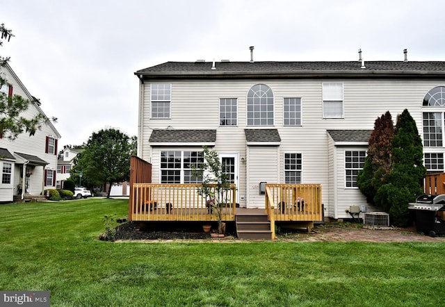 316 Wheatfield Cir, Hatfield, PA 19440 - back of house with a deck, a lawn, and roof with shingles