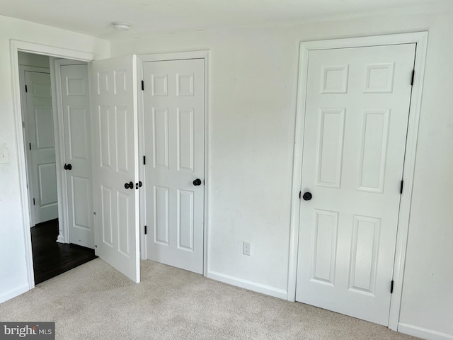 601 Mulberry St, Milton, DE 19968 - unfurnished bedroom with carpet and baseboards