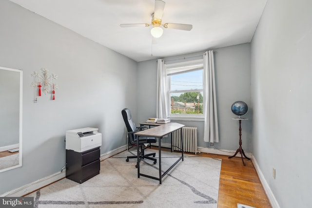 6604 Altamont Ave, Baltimore, MD 21228 - office space with radiator, ceiling fan, and light wood finished floors