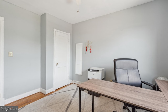 6604 Altamont Ave, Baltimore, MD 21228 - home office featuring wood finished floors and baseboards