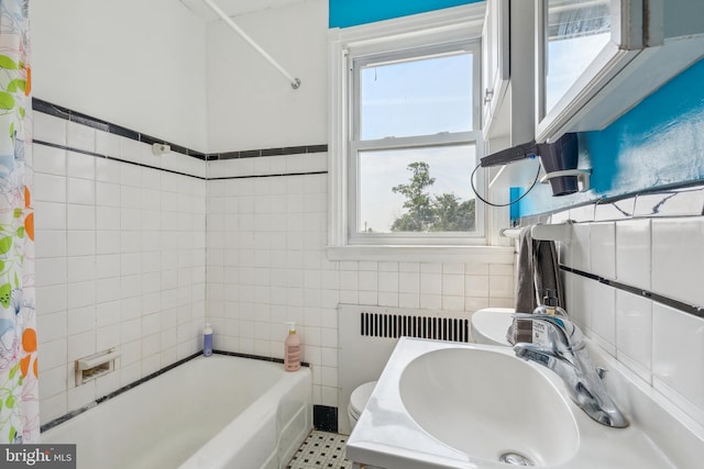 6604 Altamont Ave, Baltimore, MD 21228 - full bathroom with tile walls and radiator