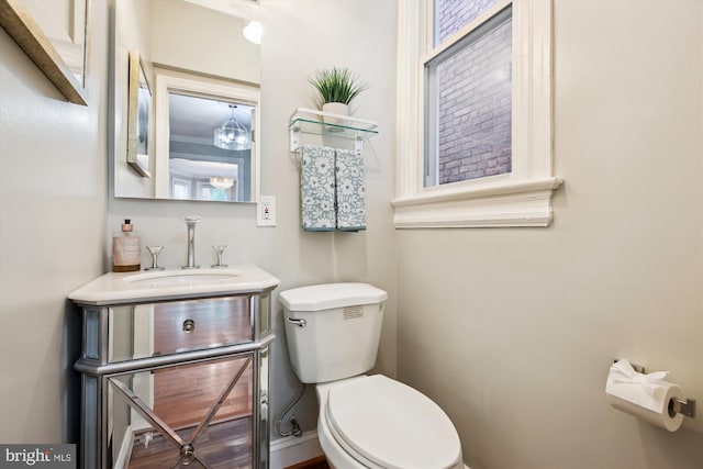 609 Elliott St NE, Washington, DC 20002 - half bathroom featuring toilet and vanity