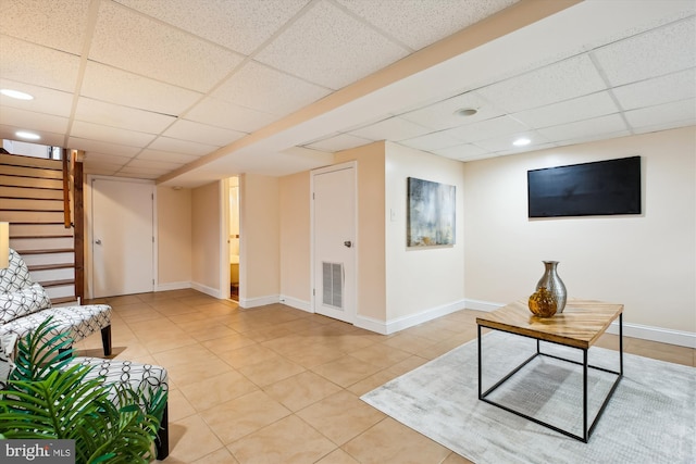609 Elliott St NE, Washington, DC 20002 - unfurnished living room with a paneled ceiling, stairs, light tile patterned floors, and recessed lighting
