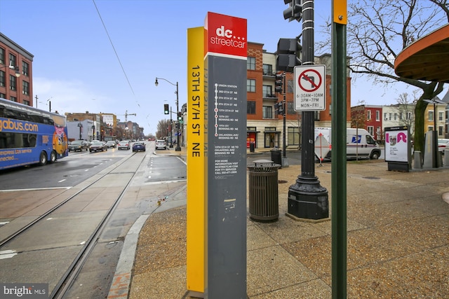 609 Elliott St NE, Washington, DC 20002 - view of asphalt road with sidewalks, street lighting, curbs, and traffic lights