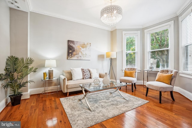609 Elliott St NE, Washington, DC 20002 - living area with hardwood / wood-style flooring, crown molding, and a chandelier