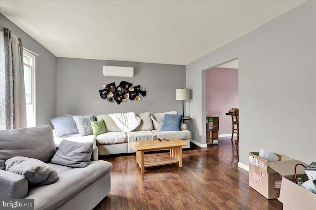 1048 Acorn, Stowe, PA 19464 - living area featuring an AC wall unit and dark wood-style floors