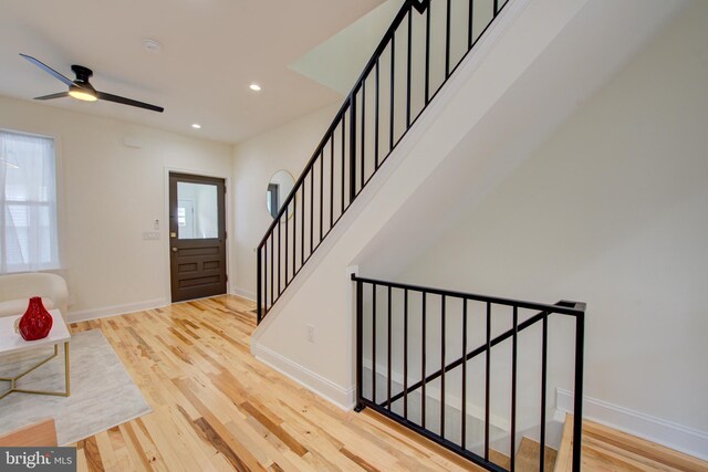 921 S Conestoga St, Philadelphia, PA 19143 - entrance foyer with wood finished floors, recessed lighting, ceiling fan, and stairs
