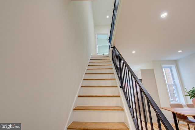 921 S Conestoga St, Philadelphia, PA 19143 - staircase with recessed lighting and wood finished floors