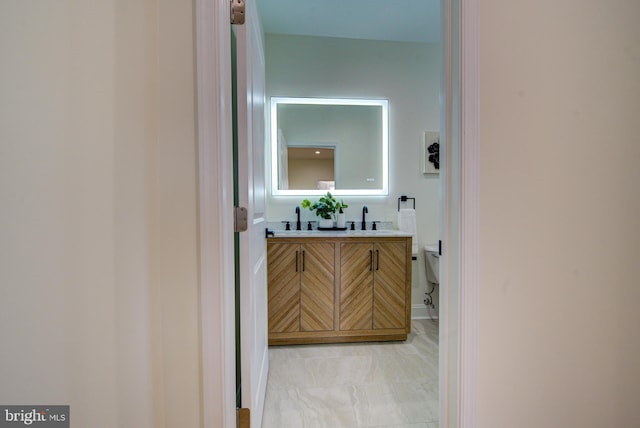 921 S Conestoga St, Philadelphia, PA 19143 - bathroom featuring double vanity and toilet