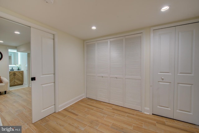 921 S Conestoga St, Philadelphia, PA 19143 - unfurnished bedroom featuring light wood finished floors and recessed lighting