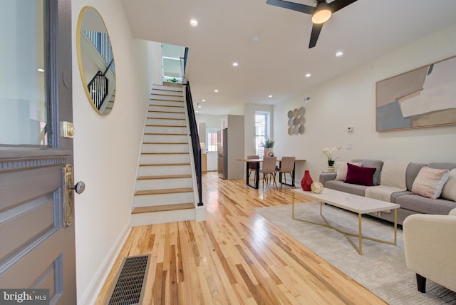 921 S Conestoga St, Philadelphia, PA 19143 - living room with stairway, wood finished floors, recessed lighting, and ceiling fan