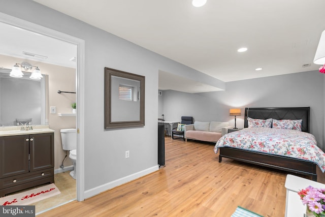 8857 Blade Green Ln, Columbia, MD 21045 - bedroom featuring light wood-type flooring, recessed lighting, and ensuite bathroom