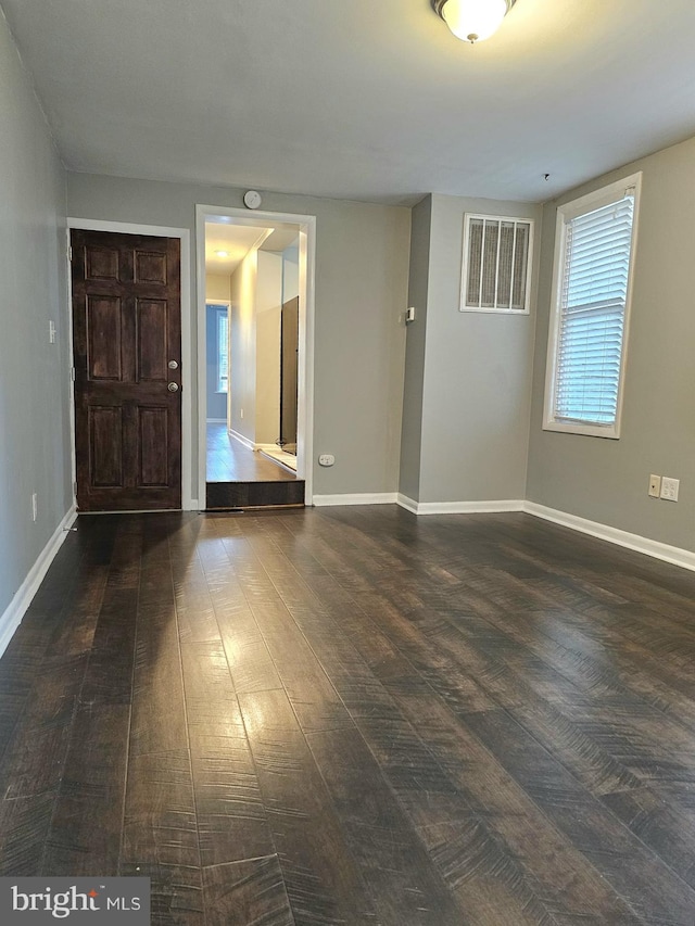 18 N 5th St, Columbia, PA 17512 - entrance foyer with dark wood-style flooring and baseboards