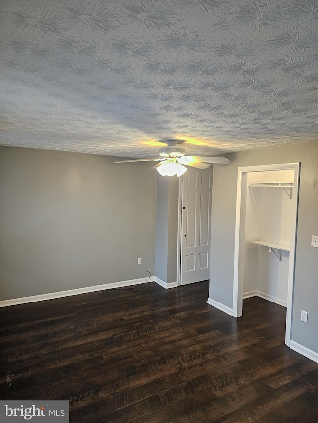 18 N 5th St, Columbia, PA 17512 - unfurnished room with a ceiling fan, a textured ceiling, and dark wood-type flooring
