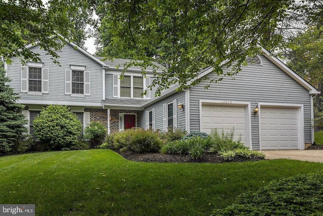 12330 Needlepine Ter, Silver Spring, MD 20904 - view of front of home featuring driveway, a front lawn, and a garage