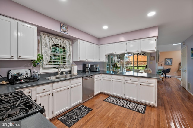 12330 Needlepine Ter, Silver Spring, MD 20904 - kitchen with dishwasher, dark countertops, white cabinetry, gas stove, and light wood finished floors