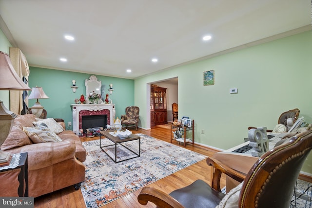 12330 Needlepine Ter, Silver Spring, MD 20904 - living room with recessed lighting, wood finished floors, crown molding, and a fireplace