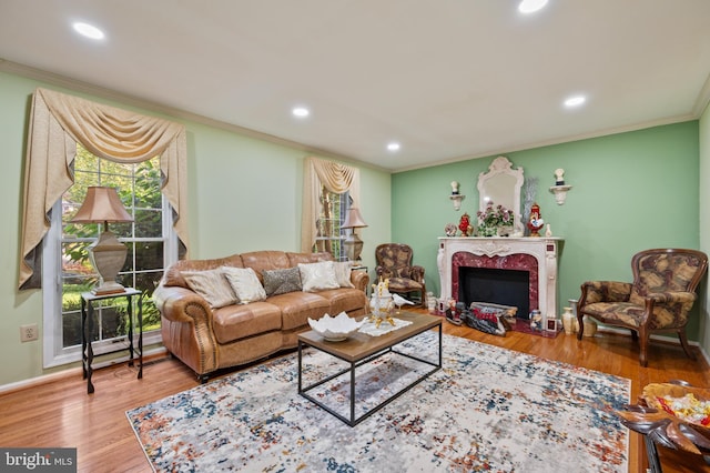 12330 Needlepine Ter, Silver Spring, MD 20904 - living room featuring ornamental molding, wood finished floors, recessed lighting, and a high end fireplace