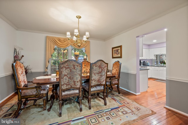 12330 Needlepine Ter, Silver Spring, MD 20904 - dining area with a chandelier, light wood-type flooring, and ornamental molding