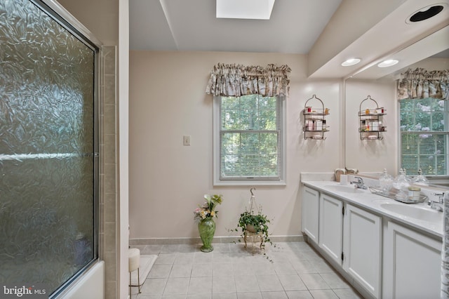 12330 Needlepine Ter, Silver Spring, MD 20904 - full bathroom with tile patterned floors, double vanity, and a skylight