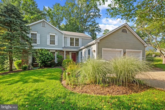 12330 Needlepine Ter, Silver Spring, MD 20904 - traditional-style home featuring a front lawn, an attached garage, brick siding, and driveway