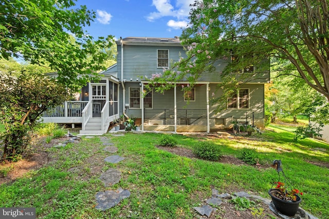 12330 Needlepine Ter, Silver Spring, MD 20904 - back of property with a sunroom, a yard, and a deck