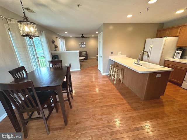 226 Prairie Ct, Quakertown, PA 18951 - dining area with light wood-style flooring, recessed lighting, ceiling fan, and a chandelier