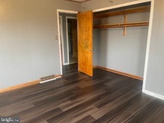 7128 Crestshire, Baltimore, MD 21222 - unfurnished bedroom featuring wood finished floors and a closet