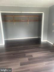 7128 Crestshire, Baltimore, MD 21222 - unfurnished bedroom with wood finished floors and baseboards