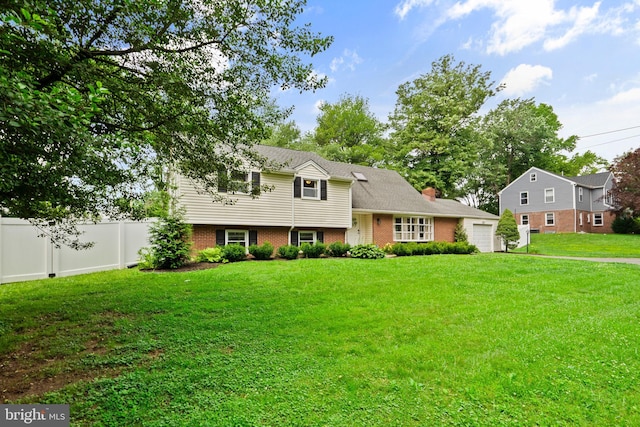 566 S Old Middletown Rd, Media, PA 19063 - split level home with brick siding and an attached garage