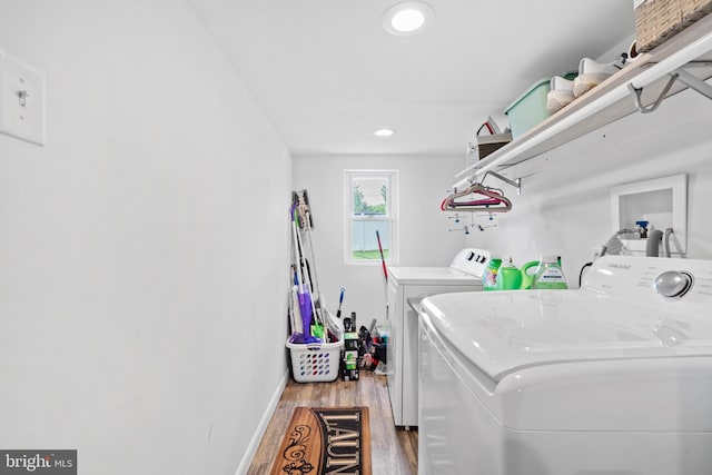 566 S Old Middletown Rd, Media, PA 19063 - laundry room with independent washer and dryer, wood finished floors, and recessed lighting