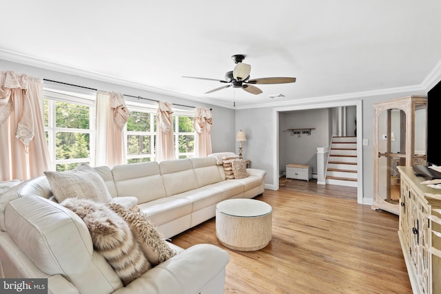 566 S Old Middletown Rd, Media, PA 19063 - living room featuring crown molding, ceiling fan, light wood finished floors, and stairway