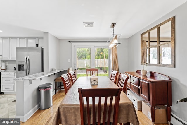 566 S Old Middletown Rd, Media, PA 19063 - dining space featuring a baseboard radiator and light wood finished floors