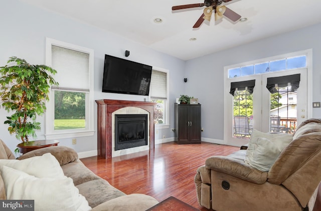 415 Grape St, Hammonton, NJ 08037 - living area with plenty of natural light, a ceiling fan, wood finished floors, a glass covered fireplace, and recessed lighting