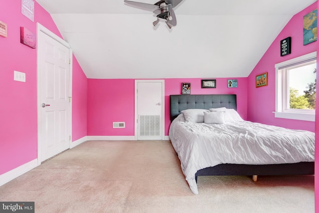 415 Grape St, Hammonton, NJ 08037 - carpeted bedroom with lofted ceiling and baseboards