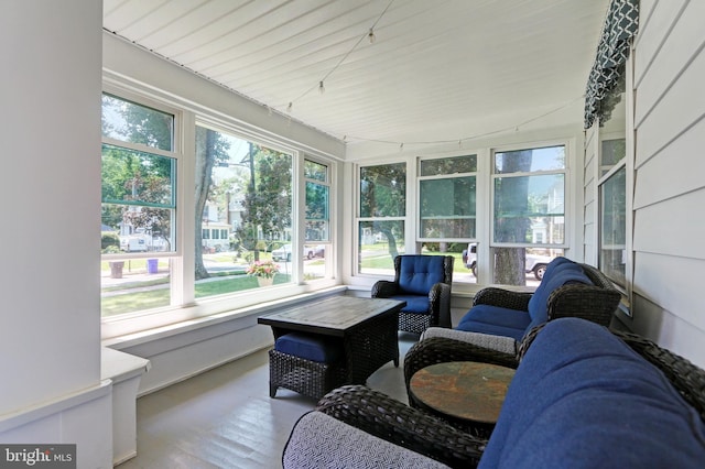 415 Grape St, Hammonton, NJ 08037 - sunroom / solarium with healthy amount of natural light, wood finished floors, and outdoor lounge area
