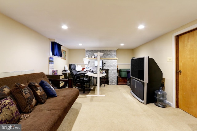 415 Grape St, Hammonton, NJ 08037 - living area with light carpet, recessed lighting, an office area, and a brick fireplace