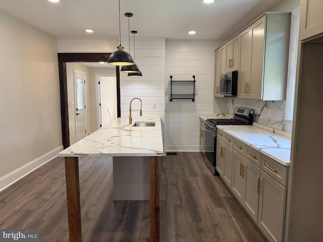 716 S Washington St, Havre De Grace, MD 21078 - kitchen with appliances with stainless steel finishes, a peninsula, gray cabinetry, recessed lighting, and light stone counters
