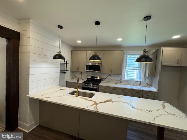 716 S Washington St, Havre De Grace, MD 21078 - kitchen with appliances with stainless steel finishes, light stone countertops, decorative backsplash, dark wood-style floors, and recessed lighting