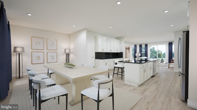 42227 Shining Star Sq, Ashburn, VA 20148 - dining area featuring light wood-style flooring and recessed lighting