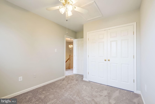 319 Chestertown St, Gaithersburg, MD 20878 - unfurnished bedroom with carpet floors, a closet, attic access, and a ceiling fan
