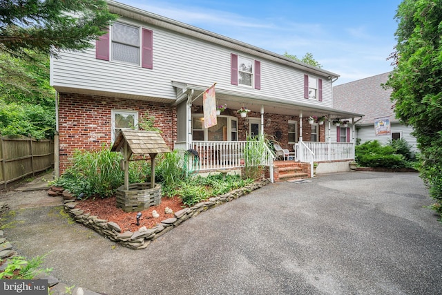 199 Cox Ave, West Creek, NJ 08092 - view of front of property featuring a porch and brick siding