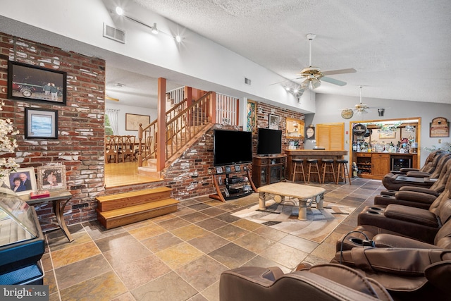 199 Cox Ave, West Creek, NJ 08092 - living room featuring a textured ceiling, ceiling fan, stairway, vaulted ceiling, and wine cooler