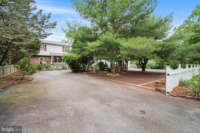 199 Cox Ave, West Creek, NJ 08092 - view of property hidden behind natural elements with brick siding