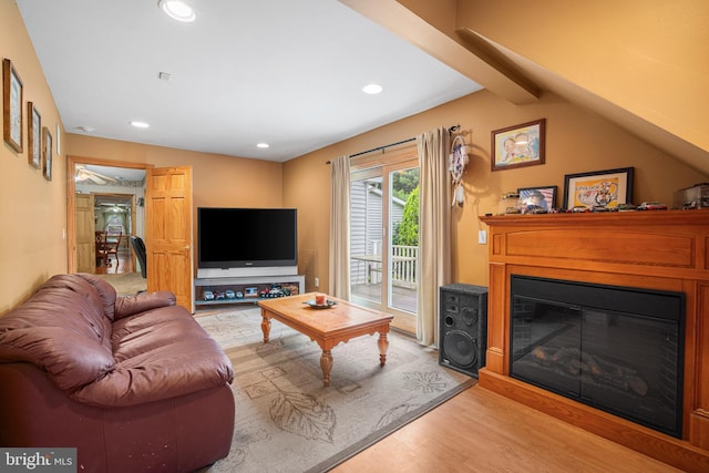 199 Cox Ave, West Creek, NJ 08092 - living room featuring wood finished floors, a glass covered fireplace, and recessed lighting