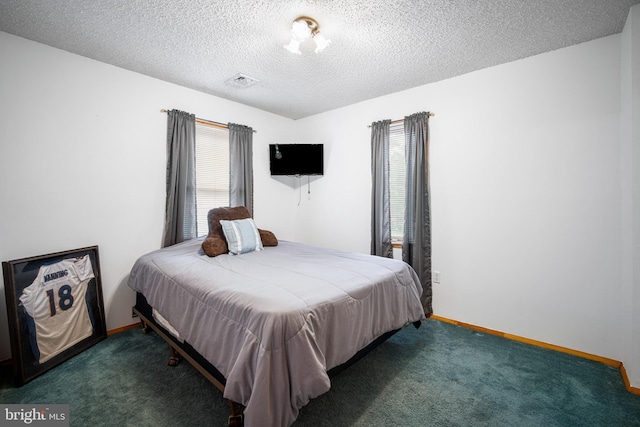 199 Cox Ave, West Creek, NJ 08092 - carpeted bedroom featuring a textured ceiling and baseboards