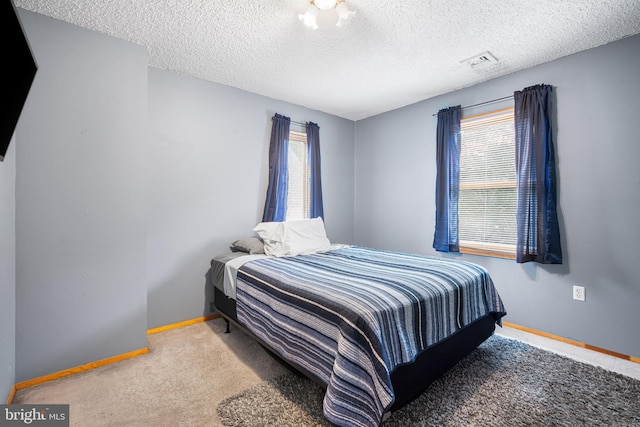199 Cox Ave, West Creek, NJ 08092 - carpeted bedroom with baseboards and a textured ceiling
