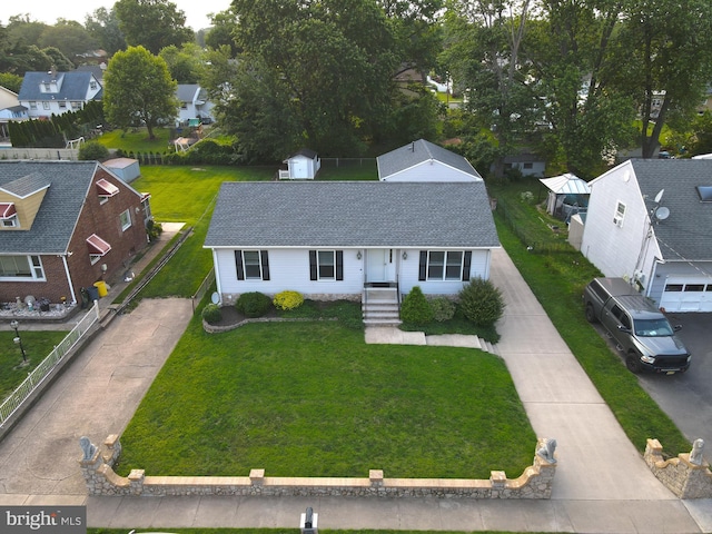 45 Wert Ave, Hamilton, NJ 08610 - view of front of house with driveway, a residential view, a front lawn, and a shingled roof